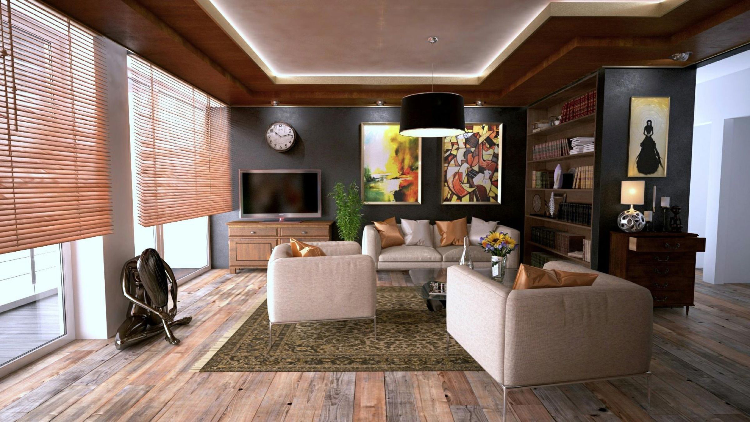 Living room with cream sofas, a timber ceiling and wooden blinds